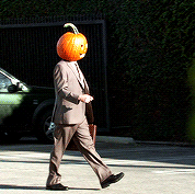pumpkin-head office worker gif.