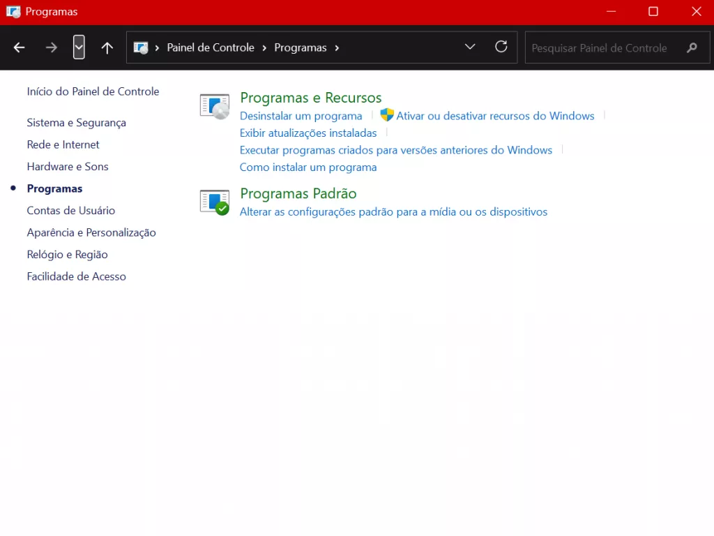 Selecione “Desinstalar um programa”