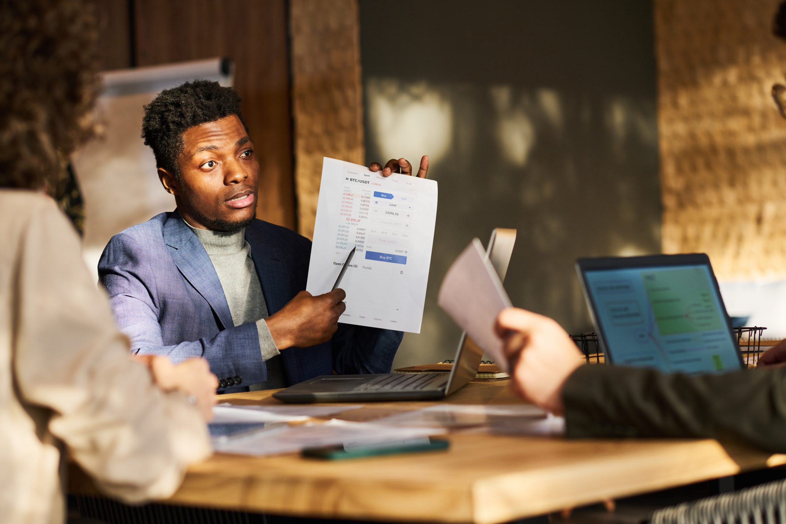 business meeting with financial data presentation