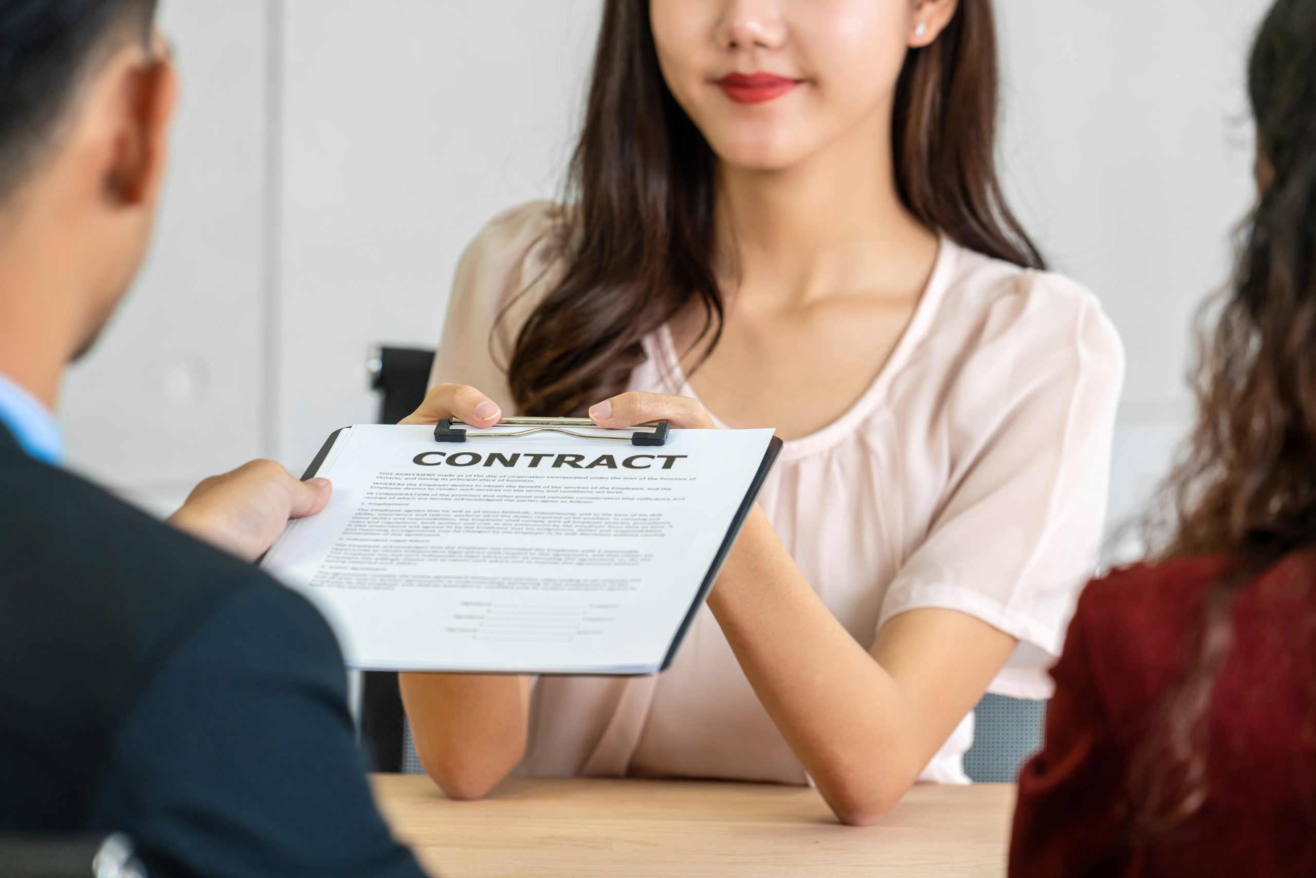 businesspeople meeting agreement contract signed